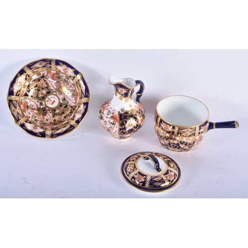 142 - A ROYAL CROWN DERBY MINIATURE WASH JUG AND BASIN together with a similar saucepan and cover. Largest... 