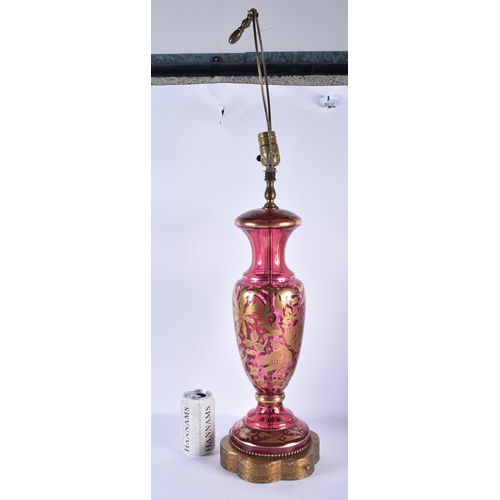 145 - A LARGE BOHEMIAN ENAMELLED RUBY GLASS COUNTRY HOUSE LAMP. 58 cm high.