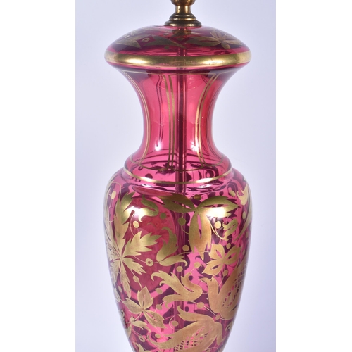 145 - A LARGE BOHEMIAN ENAMELLED RUBY GLASS COUNTRY HOUSE LAMP. 58 cm high.