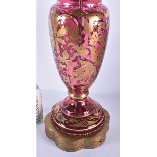 145 - A LARGE BOHEMIAN ENAMELLED RUBY GLASS COUNTRY HOUSE LAMP. 58 cm high.