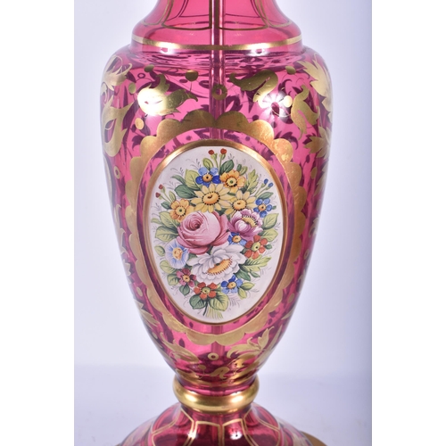 145 - A LARGE BOHEMIAN ENAMELLED RUBY GLASS COUNTRY HOUSE LAMP. 58 cm high.