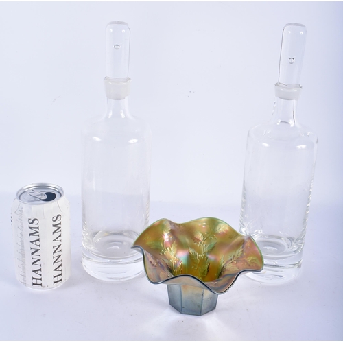 149 - A PAIR OF RETRO GLASS DECANTERS AND STOPPERS together with an iridescent glass bowl. Largest 30cm hi... 