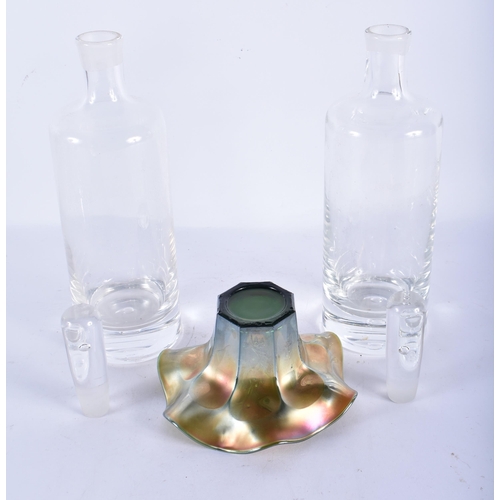 149 - A PAIR OF RETRO GLASS DECANTERS AND STOPPERS together with an iridescent glass bowl. Largest 30cm hi... 