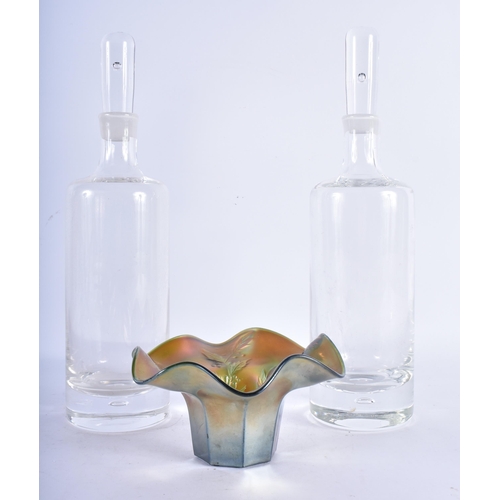 149 - A PAIR OF RETRO GLASS DECANTERS AND STOPPERS together with an iridescent glass bowl. Largest 30cm hi... 