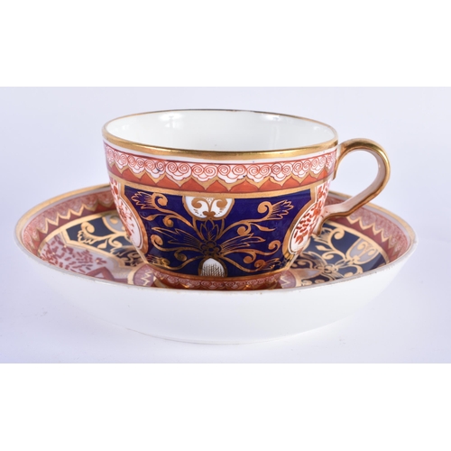 159 - Spode teacup and saucer painted with the Dollar pattern and a saucer dish in the same pattern but ... 