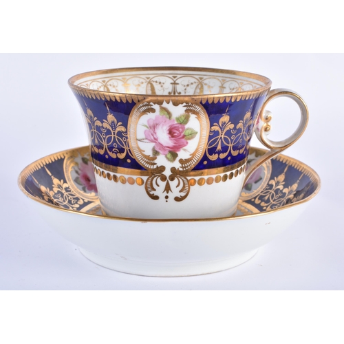 174 - Chamberlains Worcester fine breakfast cup and saucer painted with four gilt floral panels on a blue ... 