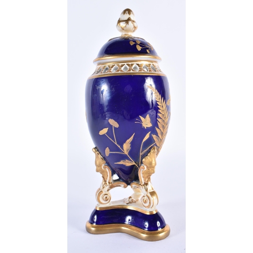 191 - Graingers Worcester vase and cover with cobalt blue ground decorated with raised gilt ferns.  22cm