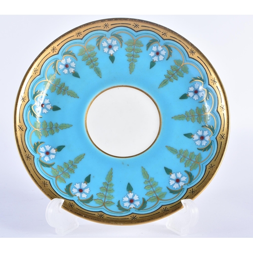 212 - Minton cup and saucer with turquoise ground with raised white flowers and green leaves in the style ... 