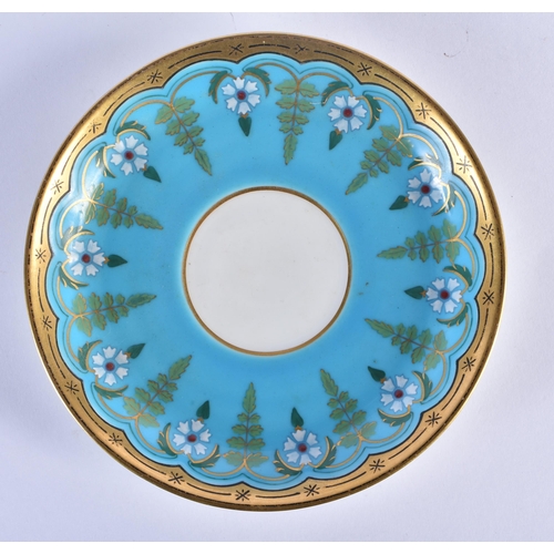 212 - Minton cup and saucer with turquoise ground with raised white flowers and green leaves in the style ... 