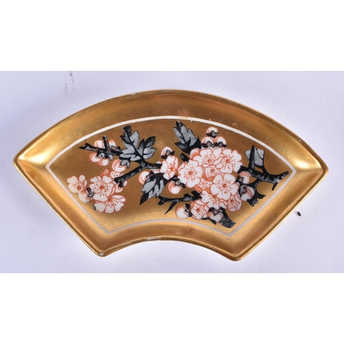 223 - Coalport set of small shaped trays with gold ground painted in Japanese style with prunus blossom.  ... 