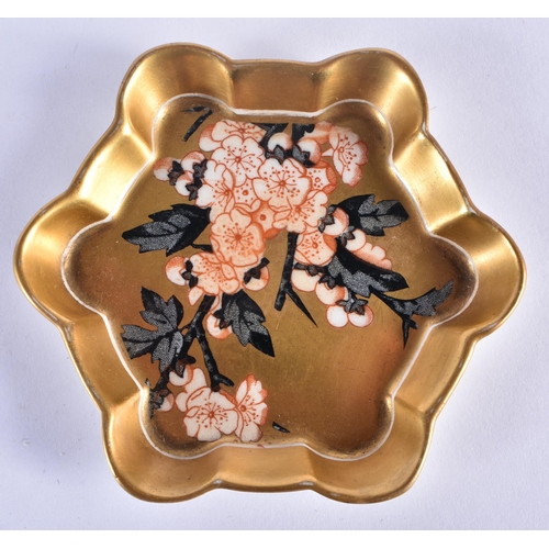 223 - Coalport set of small shaped trays with gold ground painted in Japanese style with prunus blossom.  ... 