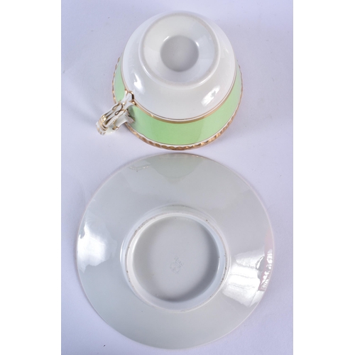 227 - Early 19th century Flight Barr and Barr cups and saucers, one in light green, one In medium green an... 