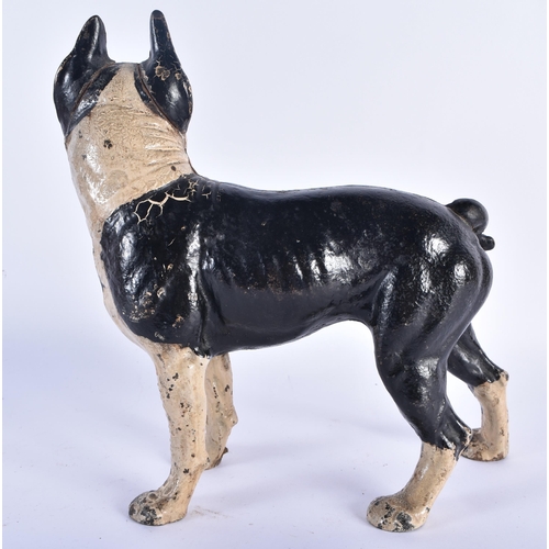 246 - A CAST IRON PUG DOG DOOR STOP. 26cm x 21 cm.