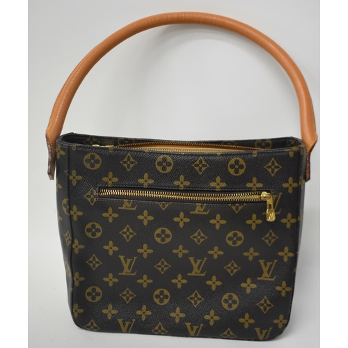 247 - A LOUIS VUITTON HANDBAG. 40 cm x 27 cm.