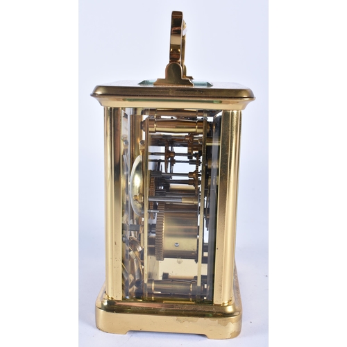 250 - A OCLEE & SON CARRIAGE CLOCK. 17 cm high inc handle.