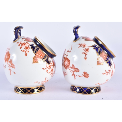 252 - A PAIR OF ROYAL CROWN DERBY IMARI CAULDRONS. 9 cm x 5 cm.