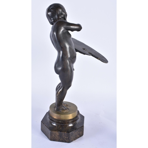 256 - AN ART DECO BRONZE FIGURE OF A YOUNG ARTIST. 32 cm high.