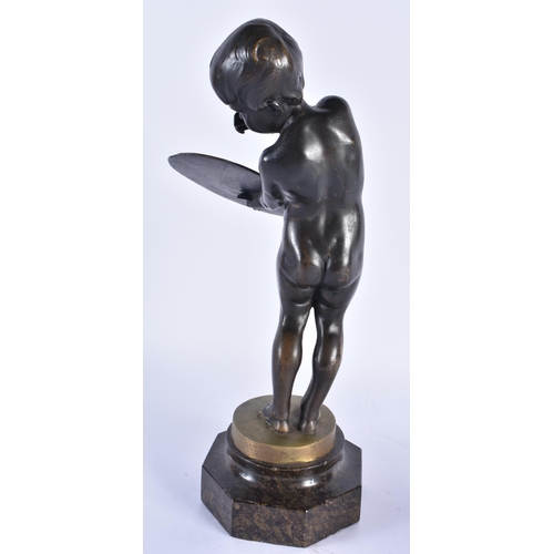 256 - AN ART DECO BRONZE FIGURE OF A YOUNG ARTIST. 32 cm high.