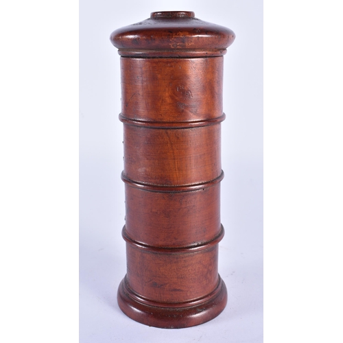 258 - A CARVED TREEN SPICE TOWER. 19 cm high.