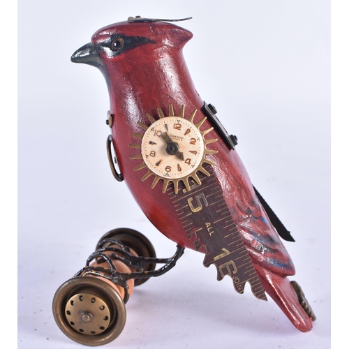 259 - AN UNUSUAL FOLK ART PAINTED WOOD CLOCK BIRD. 12 cm x 7 cm.