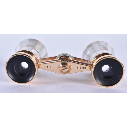 287 - A PAIR OF MOTHER OF PEARL OPERA GLASSES. 8 cm x 6 cm.