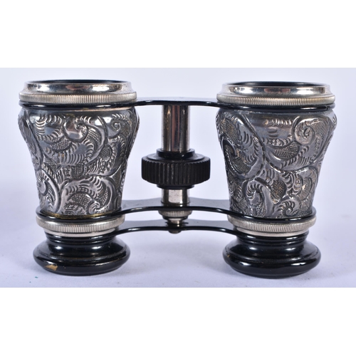 290 - A PAIR OF VICTORIAN SILVER MOUNTED OPERA GLASSES. 9 cm x 7 cm.