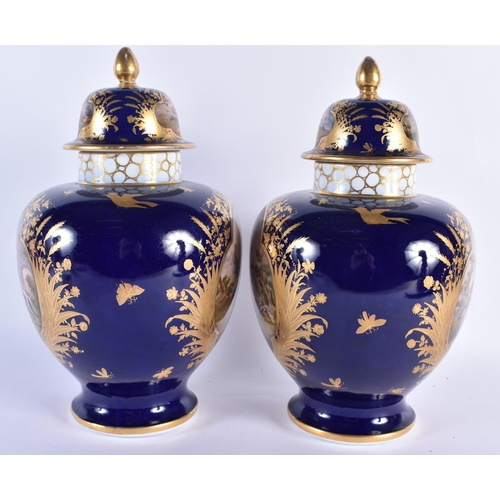 293 - A LARGE PAIR OF 19TH CENTURY GERMAN DRESDEN PORCELAIN VASES AND COVERS painted with fighting scenes.... 