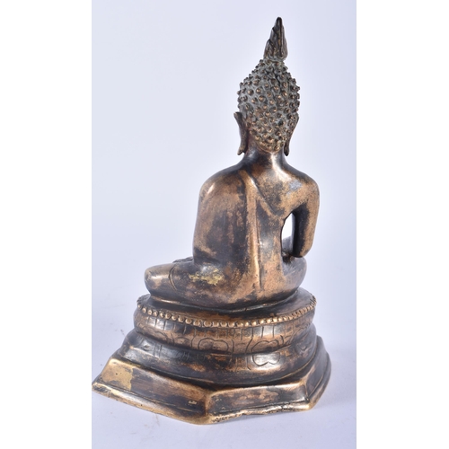 302 - A 19TH CENTURY SOUTH EAST ASIAN THAI INDIAN BRONZE FIGURE OF A BUDDHA modelled seated upon a triangu... 