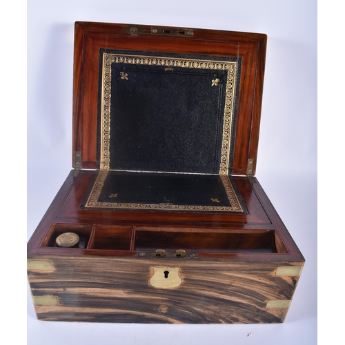 308 - A LOVELY LARGE EARLY VICTORIAN COROMANDEL WRITING BOX with brass mounts and vacant cartouche. 30cm x... 