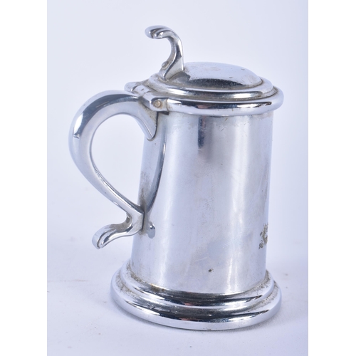 310 - A DUNHILL CHROME TANKARD TABLE LIGHTER. 9 cm x 5 cm.