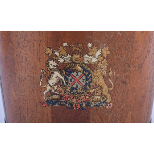 312 - AN EDWARDIAN COUNTRY HOUSE OAK AND BRASS BOUND NAVAL FIRE BUCKET painted with a coat of arms. 34 cm ... 