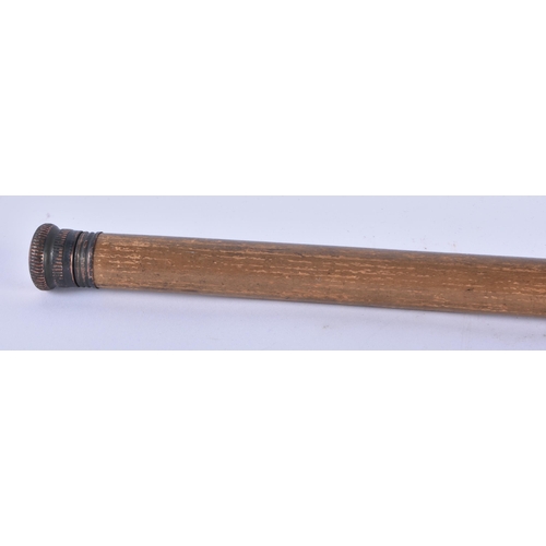 333 - A RARE ANTIQUE COMBINATION WALKING CANE the top opening to reveal a tiny toasting glass, the central... 