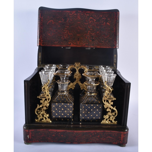 336 - A LARGE 18TH/19TH CENTURY FRENCH NAPOLEON III BOULLE TORTOISESHELL TANTALUS DECANTER SET the case de... 