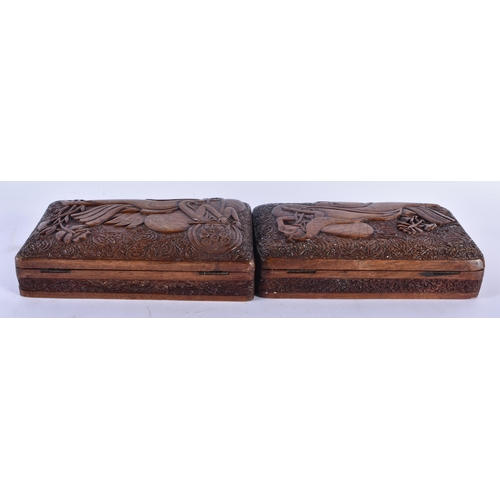 338 - A PAIR OF 19TH CENTURY ANGLO INDIAN BURMESE ASIAN CARVED WOOD CASKETS decorated in relief with figur... 