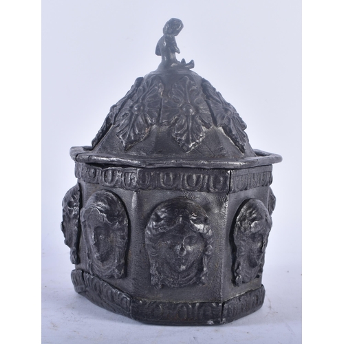 352 - AN EARLY 19TH CENTURY LEAD TOBACCO BOX AND COVER decorated in relief with classical mask heads. 17 c... 