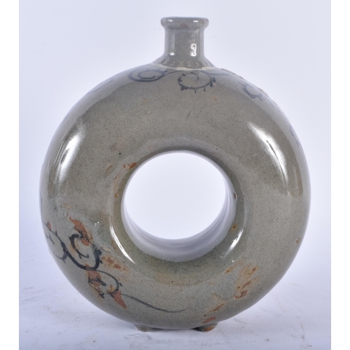 354 - A KOREAN JOSEON DYNASTY CELADON DOUGHNUT FORM STONEWARE FLASK. 18cm x 14 cm.