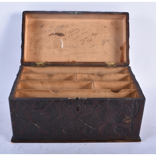 360 - A LARGE ART NOUVEAU CARVED WOOD STATIONARY BOX decorated all over with flowers and trailing vines. 2... 