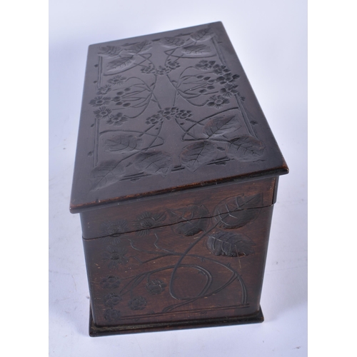 360 - A LARGE ART NOUVEAU CARVED WOOD STATIONARY BOX decorated all over with flowers and trailing vines. 2... 