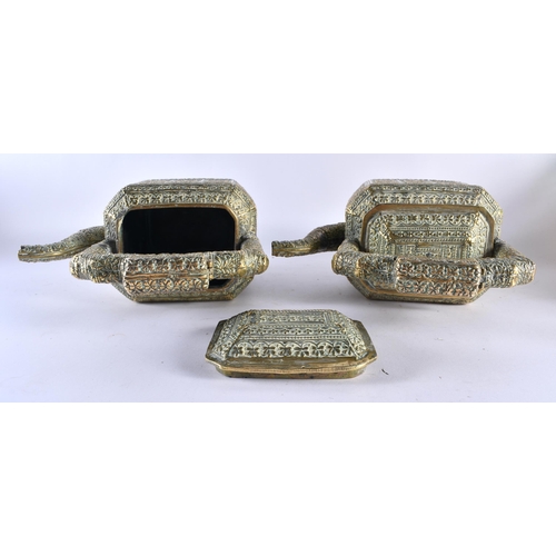 383 - A LARGE PAIR OF 19TH CENTURY INDIAN BRONZE TEAPOTS AND COVERS decorated with floral sprays and vines... 