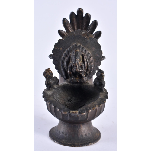 404 - A 19TH CENTURY NEPALESE INDIAN BRONZE RITUAL VESSEL formed with buddhistic figures. 18cm x 16 cm.