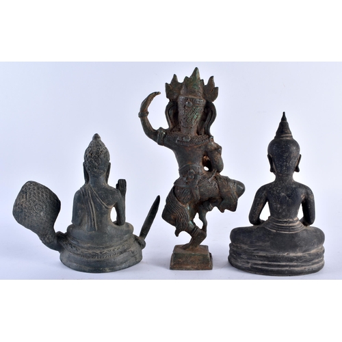 407 - THREE 19TH CENTURY SOUTHEAST ASIAN BRONZE BUDDHA modelled in various stances. Largest 20.5 cm high. ... 