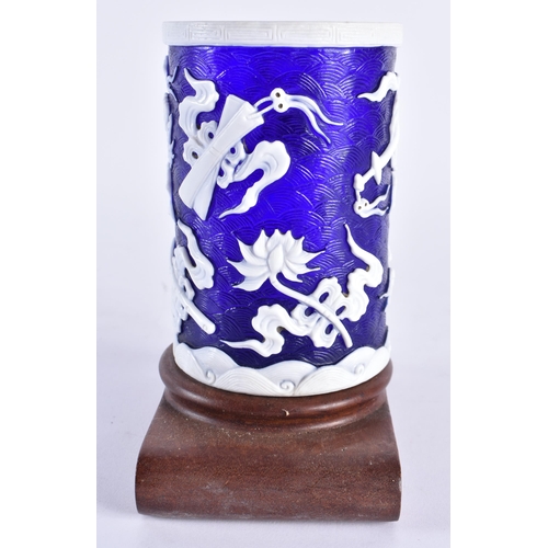 420 - A CHINESE QING DYNASTY BLUE PEKING GLASS BRUSH POT overlaid with precious objects. 11cm x 7 cm.