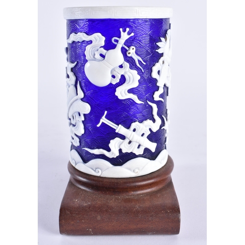 420 - A CHINESE QING DYNASTY BLUE PEKING GLASS BRUSH POT overlaid with precious objects. 11cm x 7 cm.