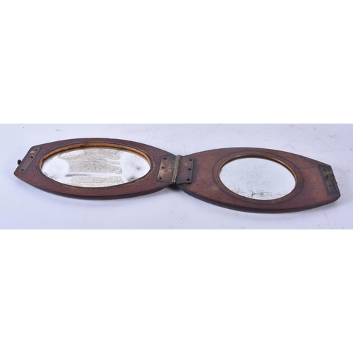 427 - AN ANTIQUE MILITARY CARVED WOOD FOLDING CAMPAIGN SHAVING MIRROR. 30cm x 9.5 cm extended.