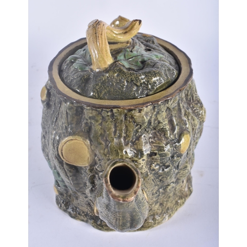 431 - A VICTORIAN MAJOLICA TEAPOT AND COVER together with a matching pewter mounted jug. Largest 20 cm x 1... 