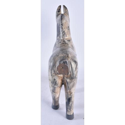 434 - A LARGE EARLY 20TH CENTURY CARVED FOLK ART PAINTED WOOD HORSE modelled standing. 36 cm x 22 cm.