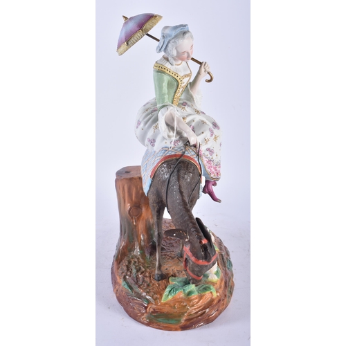 435 - A RARE 19TH CENTURY FRENCH BISQUE PORCELAIN FIGURE OF A FEMALE modelled riding upon a donkey with be... 