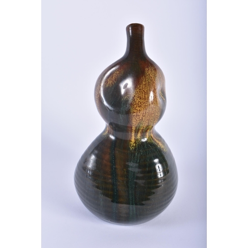 460 - A VERY RARE LINTHORPE ART POTTERY JAPANESE STYLE SAKI BOTTLE designed by Dr Christopher Dresser. 20.... 