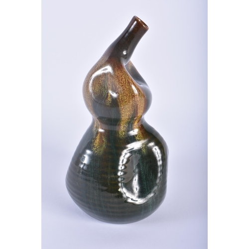 460 - A VERY RARE LINTHORPE ART POTTERY JAPANESE STYLE SAKI BOTTLE designed by Dr Christopher Dresser. 20.... 