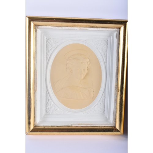 463 - A PAIR OF 19TH CENTURY PLASTER COUNTY HOUSE CLASSICAL PORTRAIT PANELS within giltwood frames. 24 cm ... 